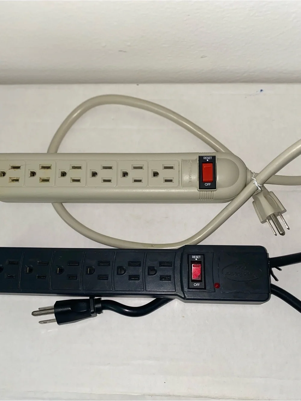 2 Electrical Outlet/Surge Protector Power Strips with Reset Switch.Black & Beige